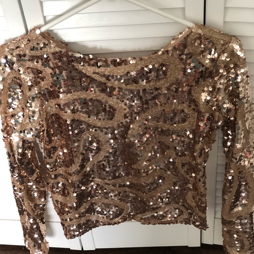 Blusa lentejuelas doradas